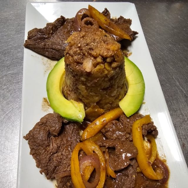 Bistec Encebollado / Onion Beef Mofongo.