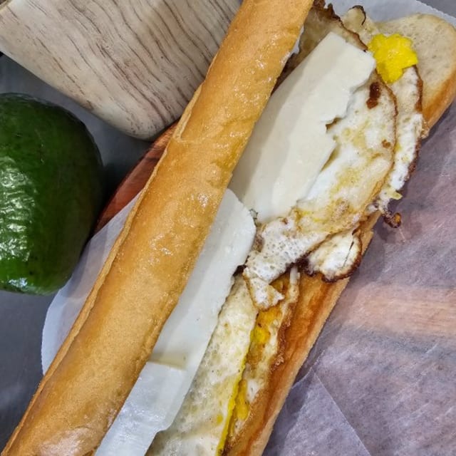 Huevo Y Queso / Egg and Cheese Sandwich.